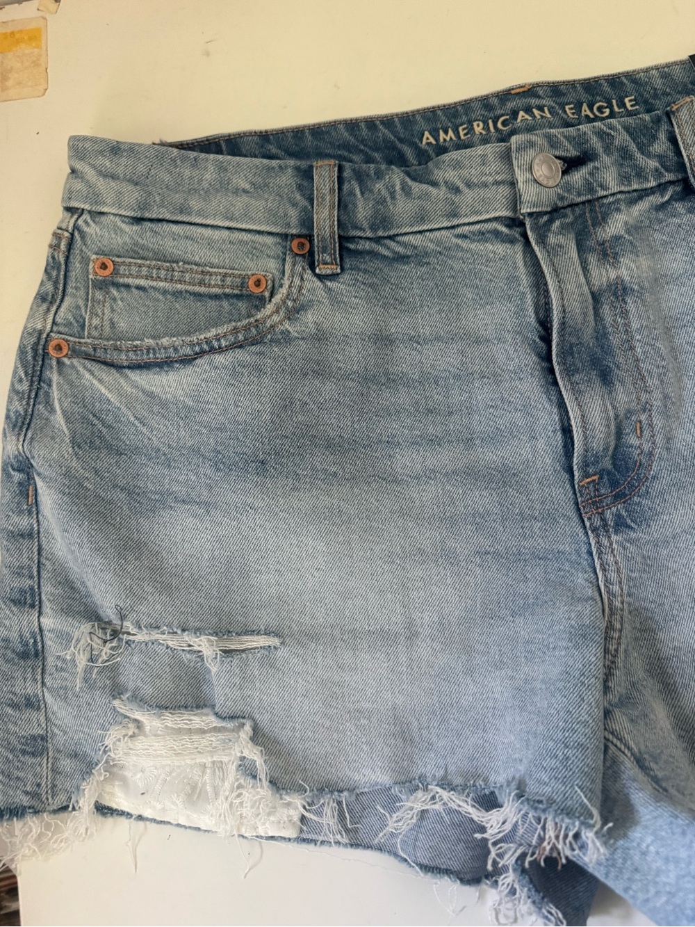 American Eagle Outfitters Light Wash Distressed Denim Cutoff Shorts - Picture 4 of 14